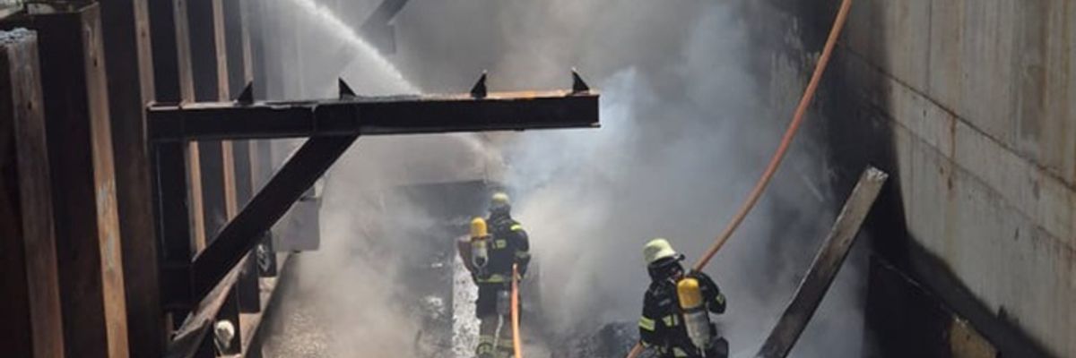 FW-M: Baumaterial in Brand (Bogenhausen)